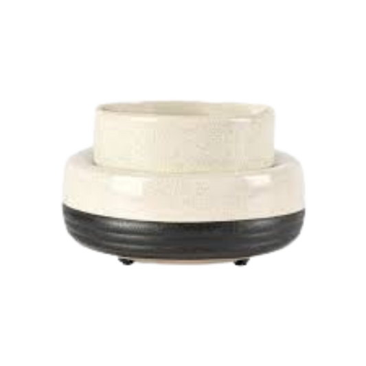 Round ceramic bowl with black base on a white background